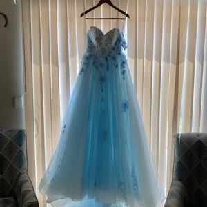 A beautiful ball gown baby blue dress